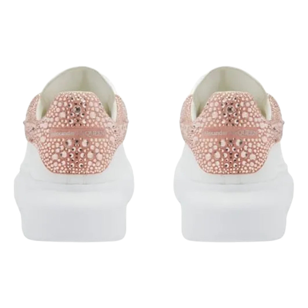 Alexander McQueen oversized casual sneakers in gold and rose with crystal details.