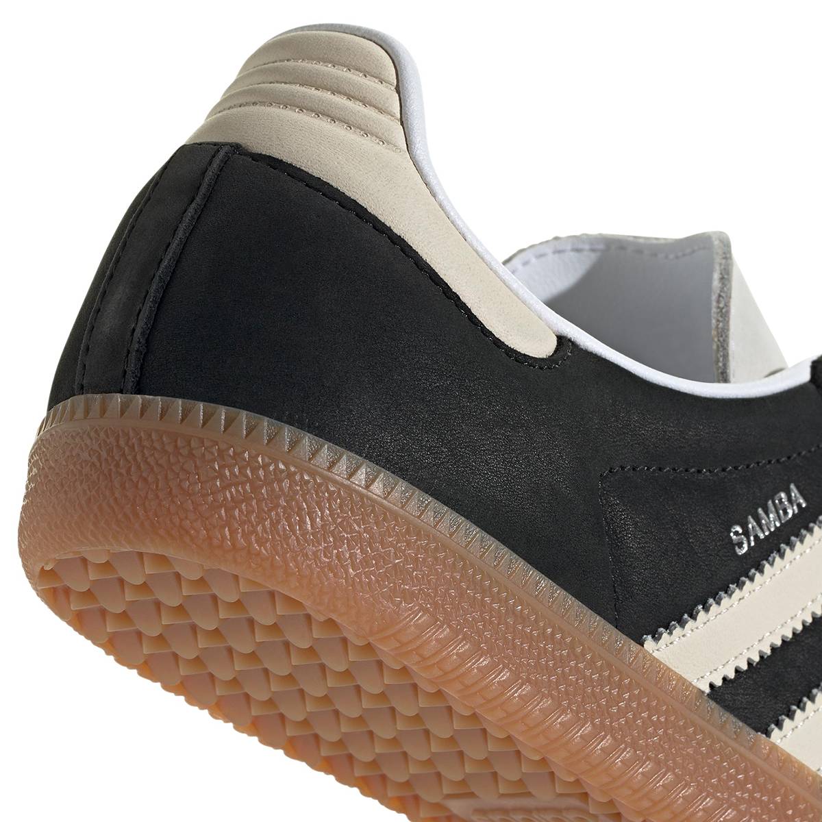 Unisex black and bone casual Samba sneakers by JMK OUTLET with a classic design and comfortable fit.
