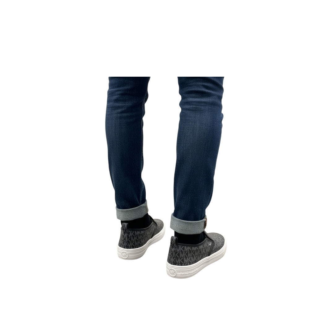 Unisex black and white casual sneakers from MK with a sleek design and comfortable fit.