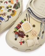 Unisex JMK OUTLET CROCS Classic Clog 2 in vibrant colors, featuring a slip-on design and comfortable fit.